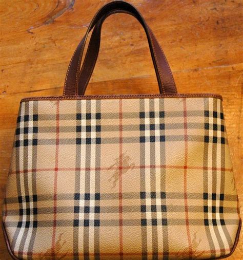 come riconoscere un portafoglio burberry originale|Come Riconoscere Una Borsa Burberry Originale (2024).